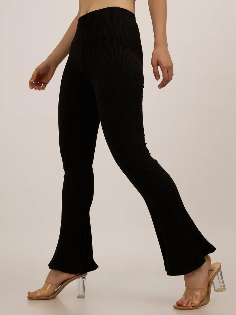 Outzidr black Black Ribbed Basic Flared Leggings for Women | Best Price UAE